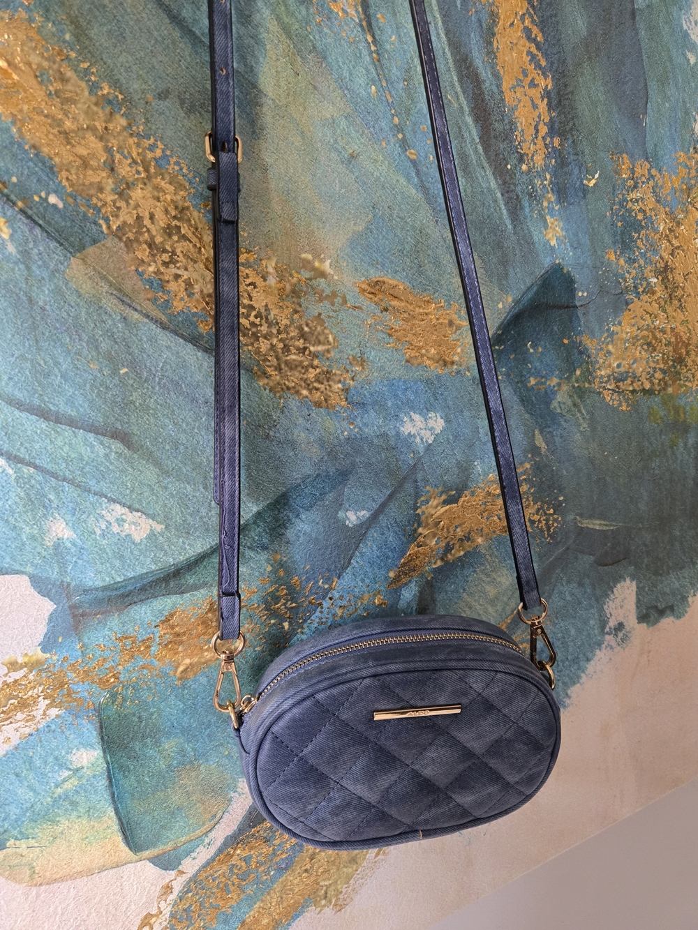 Aldo Blue Quilted Oval Crossbody Bag with Gold Accents